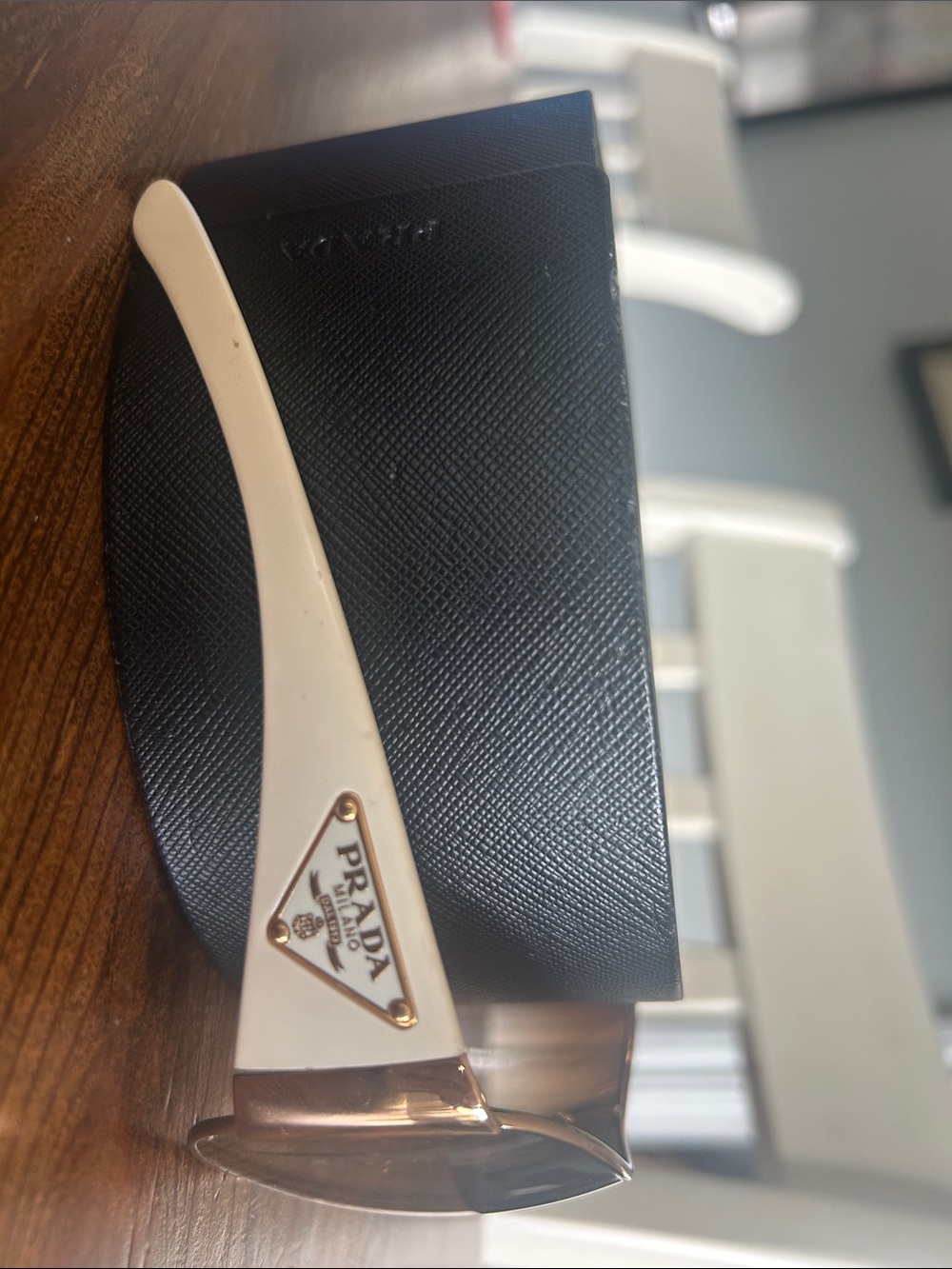Prada Cream Frames with Gold Triangle Logo and Brown Lenses
